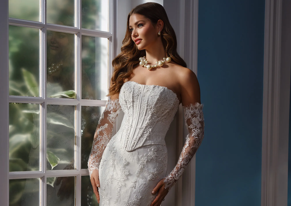 Model wearing a white gown by Martin Thornburg