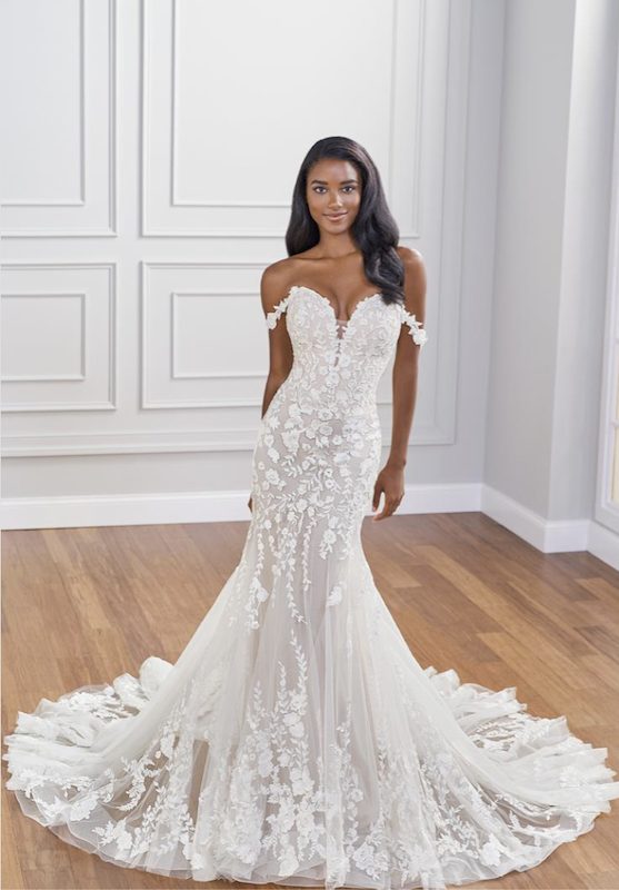 Model wearing a white gown by Martin Thornburg