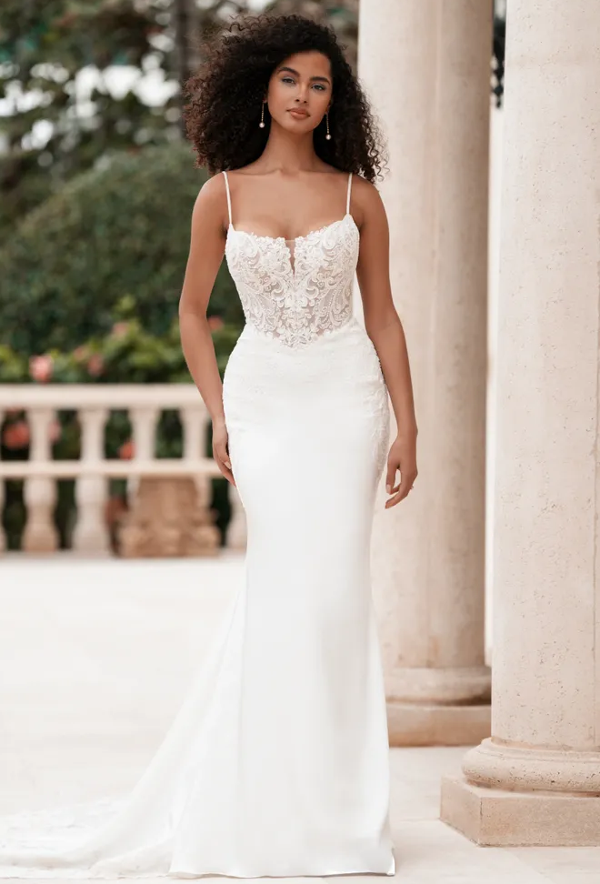 Brunette woman wearing a detachable stretch Mikado train wedding dress featuring a beautifully